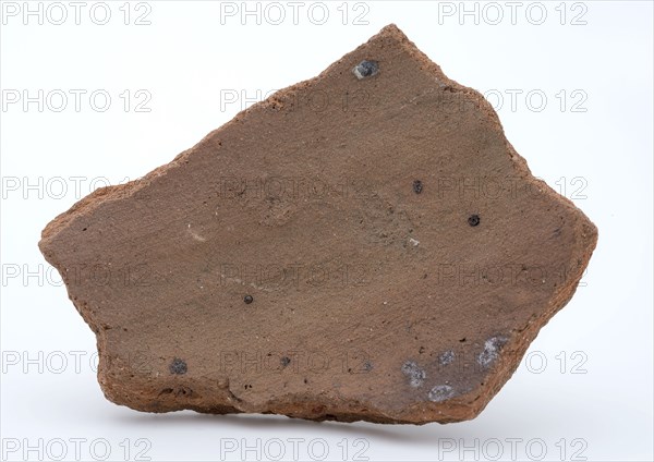 Fragment of red earthenware, partly with glaze, fragment crockery holder kitchen utensils earthenware ceramics earthenware glaze