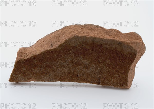 Fragment of red earthenware, partly glazed, fragment crockery holder kitchen utensils earthenware ceramics earthenware glaze