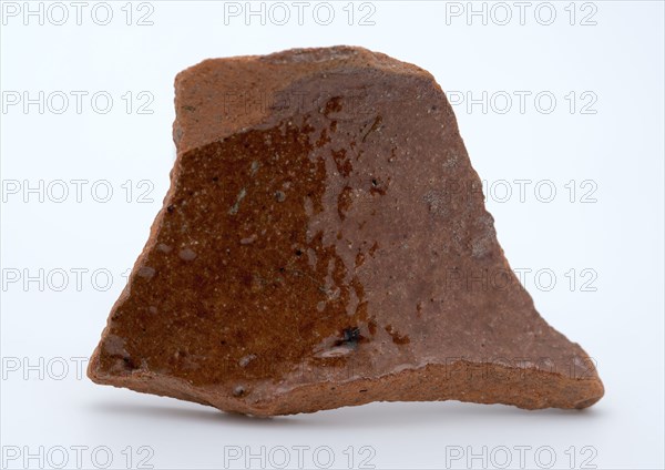 Fragment of red earthenware, partly glazed, fragment crockery holder kitchen utensils earthenware ceramics earthenware glaze