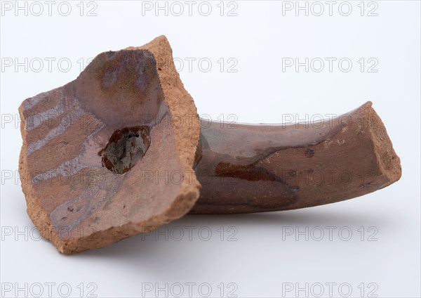 Fragment of red earthenware, partly glazed, fragment crockery holder kitchen utensils earthenware ceramics earthenware glaze