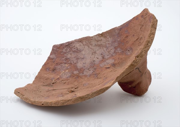 Fragment of red earthenware, partly glazed, fragment crockery holder kitchen utensils earthenware ceramics earthenware glaze