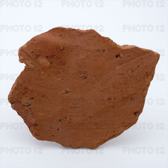 Fragment of red earthenware, partly with glaze, fragment crockery holder kitchen utensils earthenware ceramics earthenware glaze