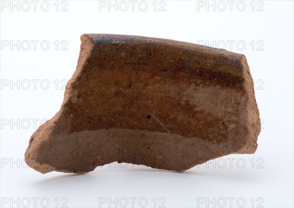 Fragment of red earthenware, partly glazed, fragment crockery holder kitchen utensils earthenware ceramics earthenware glaze