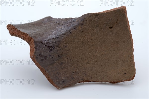 Fragment of red earthenware, partly glazed, fragment crockery holder kitchen utensils earthenware ceramics earthenware glaze