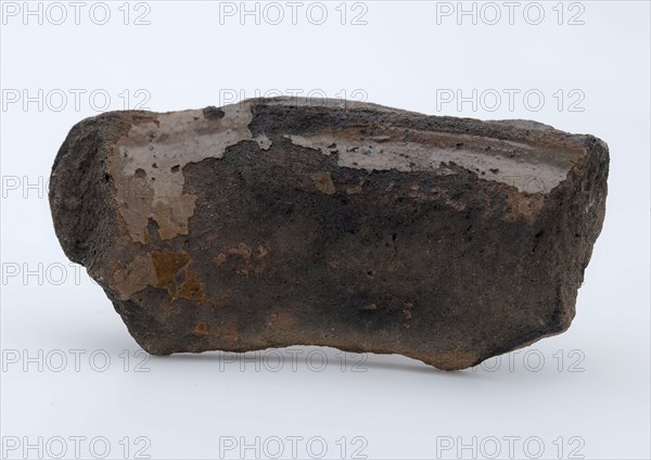 Fragment of red earthenware, partly glazed, fragment crockery holder kitchen utensils earthenware ceramics earthenware glaze