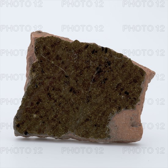 Fragment of red earthenware, partly glazed, fragment crockery holder kitchen utensils earthenware ceramics earthenware glaze