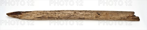 Polished wooden post, shaft of boat hook or oar, pile ground find timber, cut Wood pile. Highlighted Open nail hole and remnants