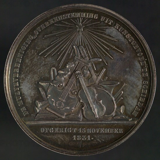 Medal on the occasion of the 25th anniversary of the Muziekgezelschap Ondereenstemming uit Kunstgevoel in Schiedam, penning