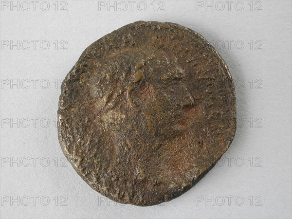 Ash, from Emperor Trajan, 98-117, axis currency money exchange resource discovery bronze, minted Roman coin axis minted