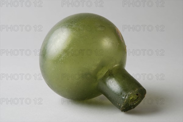 Fire grenade, fragmentation grenade, grenade weapon ground find glass, cast Green glass ball with attached short cylindrical