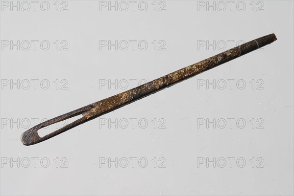 Flat copper needle with elongated oval eye, needle soil finding copper brass metal, cast archeology Rotterdam City Triangle