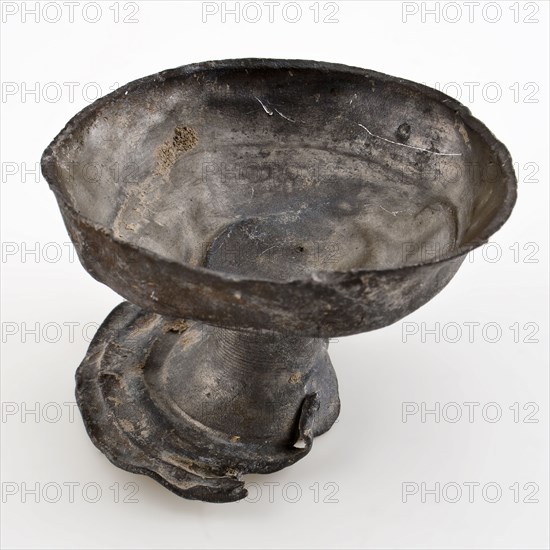 Pewter stacking cup on stand, cup holder soil find tin metal, cast pewter cup on base. Tin holder in the shape of chalice