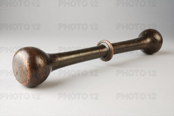 Bronze stamper, pestle tools equipment bronze, cast Round handle with ring shaped profiled in the middle At the ends pear-shaped