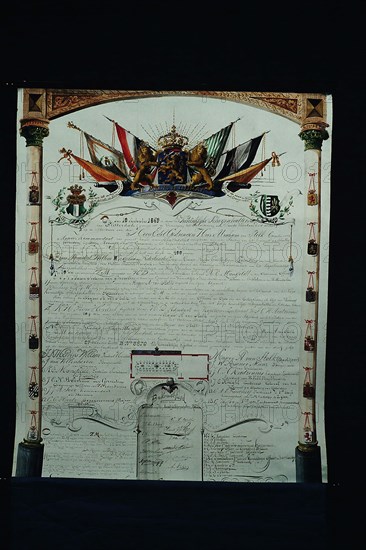 Calligraphed document on parchment (in lead sleeve ) belonging to memorial . Van Stolk Czn, in honor of the visit of King