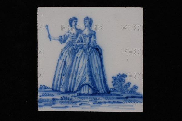 Jan Aalmis sr., Blue white tile with two ladies in long gowns, wall tile tile sculpture ceramic earthenware glaze, baked 2x