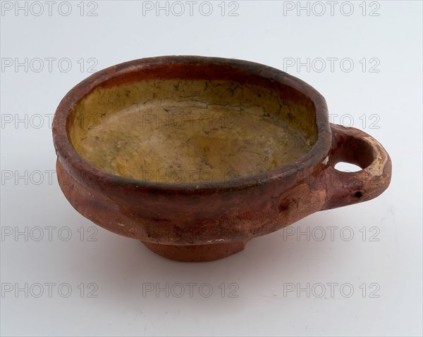 Earthenware bowl, toys, internal yellow glazed, one horizontal sausage ear, on stand, porcelain crockery holder toy relaxant