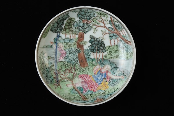 Dish of cup and saucer with lying woman and man in landscape in bushes, cup and saucer drinking utensils tableware holder