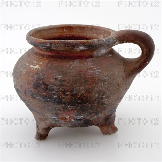 Pottery cooking jug, grape model, internally glazed, on three legs, cooking jug be found in the earthenware ceramic earthenware