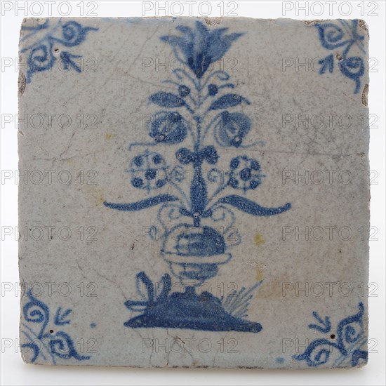 Earthenware tile with flower vase and ox head corner decoration in blue on white background, wall tile tile visualization earth