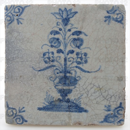 Pottery tile with flower vase and ox head corner decoration in blue on white background, wall tile tile visualization earth