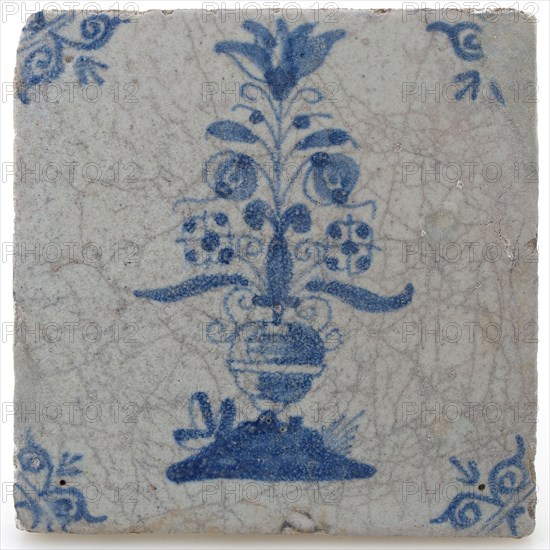 Pottery tile with flower vase and ox head corner decoration in blue on white background, wall tile tile visualization earth