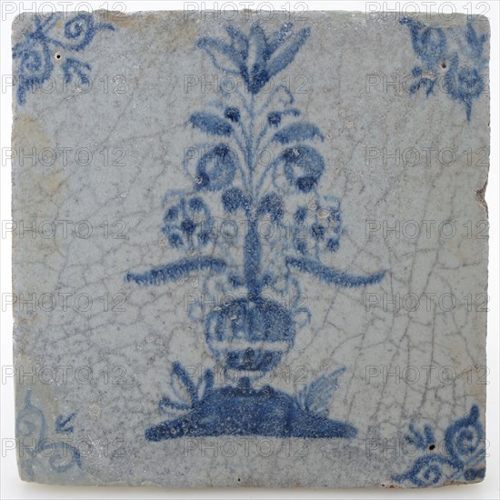 Earthenware tile with flower vase and ox head corner decoration in blue on white background, wall tile tile visualization earth