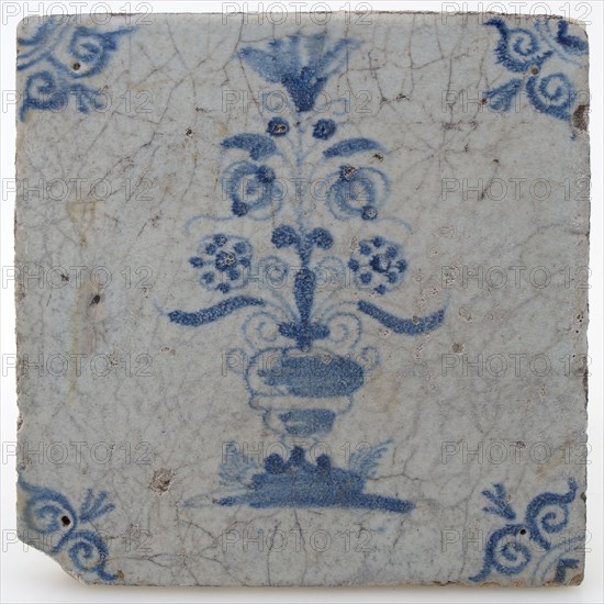 Pottery tile with flower vase and ox head corner decoration in blue on white background, wall tile tile visualization earth