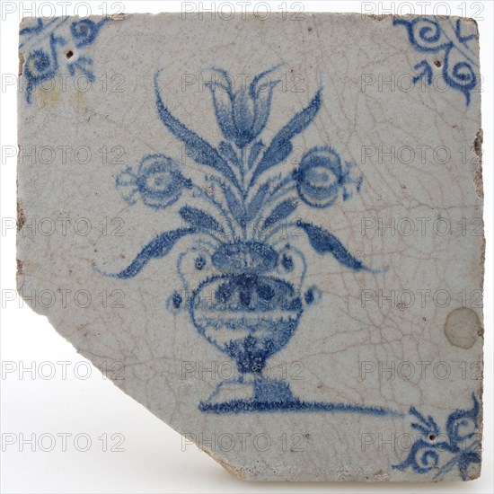 Pottery tile with flower vase and ox head corner decoration in blue on white background, wall tile tile visualization earth