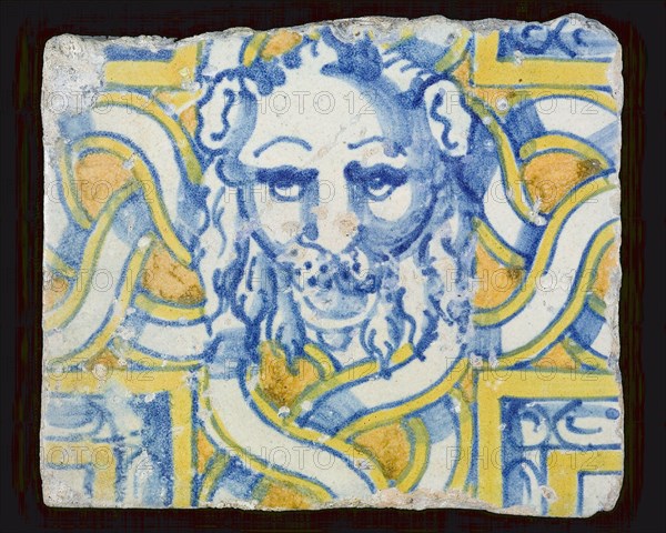 Tile, multicolored, blue, yellow, orange, with lion's head in plaiting, wall tile tile sculpture ceramics pottery glaze tin