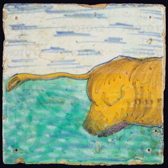 Sea-weed tile, in blue, green and orange on white, back of an unknown animal with the legs in the water, tile picture footage