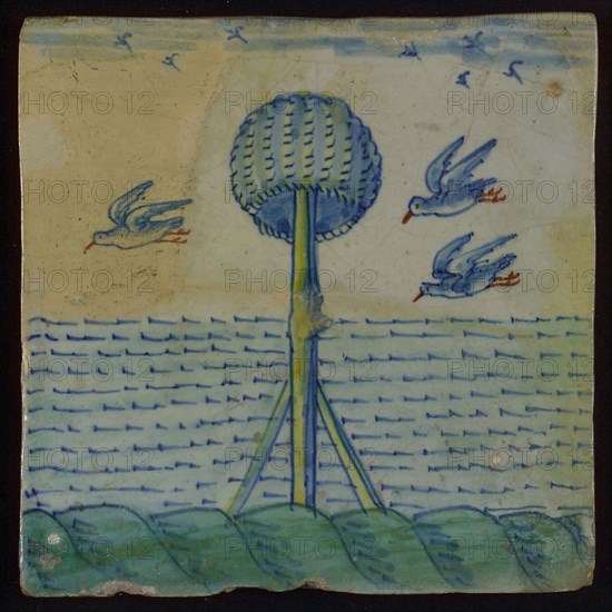 Multi-colored tile, blue, green, yellow and red on white ground, beacon In the sea with reverse basket, around which three birds