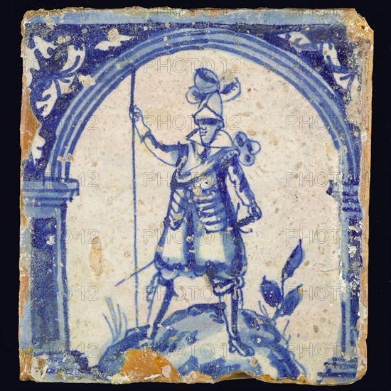 Figure tile, in blue on white, warrior with skewer, wall tile tile sculpture ceramic earthenware glaze, baked 2x glazed painted