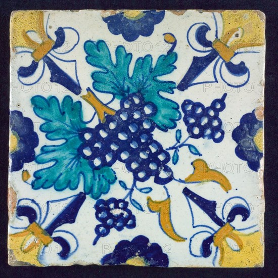 Ornament tile with bunch of grapes, corner motif lily, wall tile tile sculpture ceramic earthenware glaze, baked 2x glazed