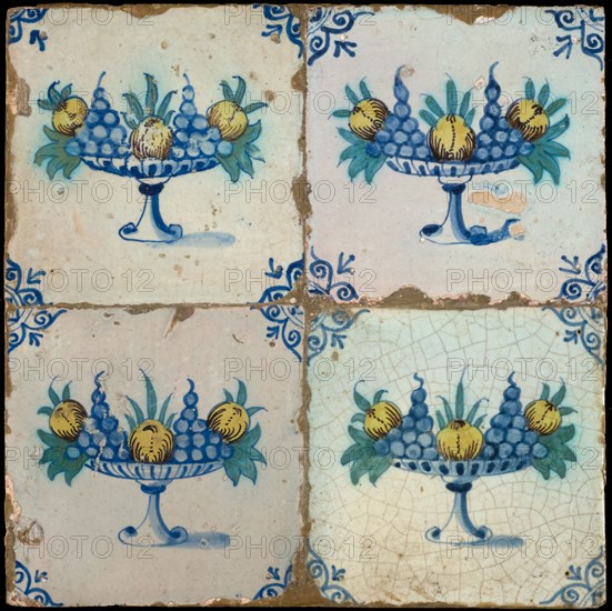 Tile field, four tiles, fruit decor, yellow, green, blue on white, high fruit scale on foot, corner pattern ox head, tiled field