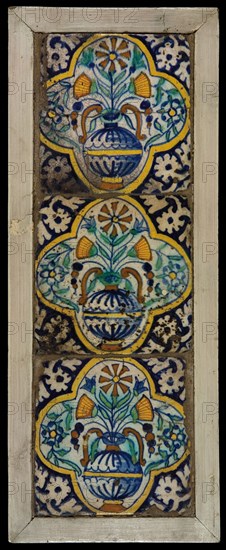 Tile field, three ornament tiles, yellow, orange, green and blue on white, flowerpot in quatrefoil, corner pattern palmet, tiled