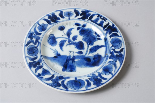 White dish with blue Oriental figure and flowers, dish plate tableware holder ceramic porcelain glaze, baked painted glazed