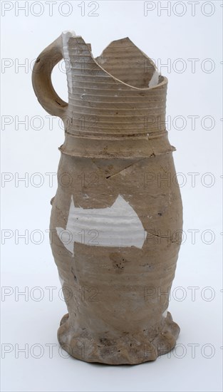 Fragment stoneware jug on pinched foot with slightly curved body and cylindrical neck, jug jug crockery holder fragment soil