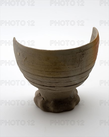 Fragment stoneware cup on pinched foot, hemisphere model on narrow foot, beaker crockery holder soil find ceramic stoneware