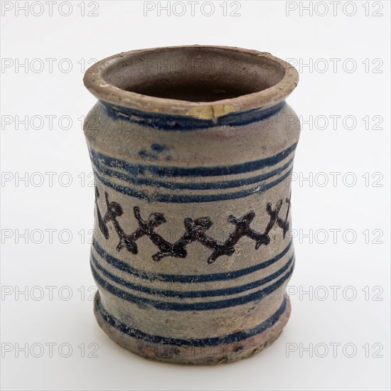 Pottery ointment jar, majolica albarello with two constrictions, blue rings and cross decor in manganese, albarello holder soil