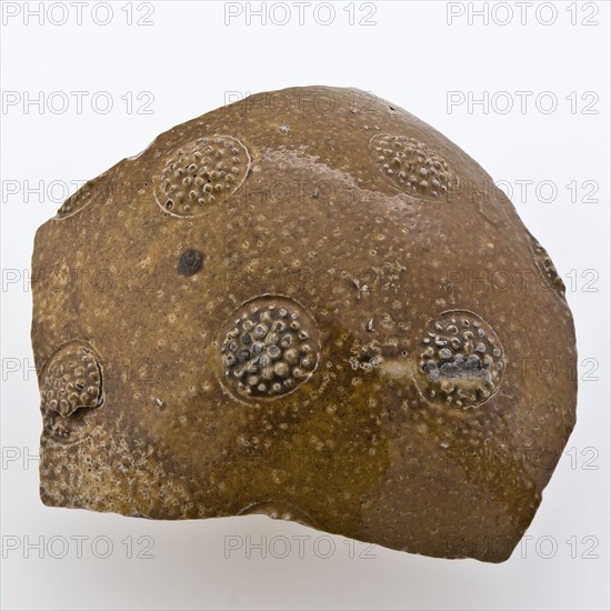 Belly fragment of stoneware jug decorated with bramble buds, jug crockery holder fragment soil found ceramic stoneware glaze