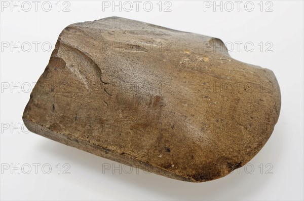 Fragment of flint ax from the Stone Age, ax tool equipment earth find flint, minced sanded Half ax from the stone age. Closed ax