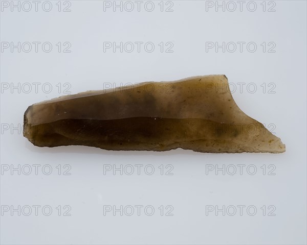 Flint point of yellowish, translucent flint, point artifact soil finding flint, mined Small point of flint from the stone age