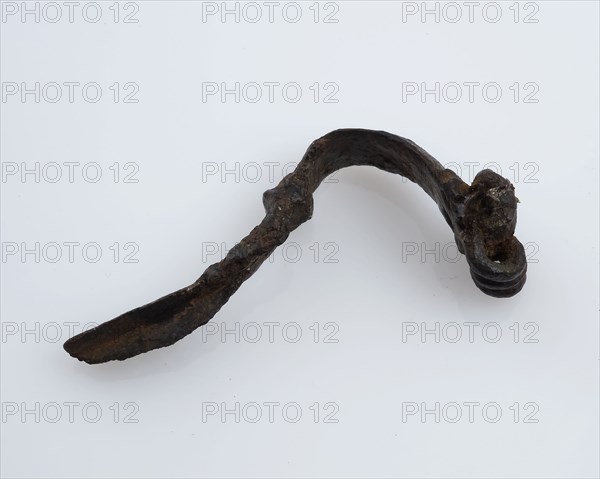Bronze fibula or cloak pin, narrow curved model, fibula fastener soil find bronze metal, cast drawn bronze fibula or mantle pin