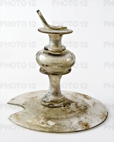 Fragment of foot, trunk and calyx of chalice, drinking glass drinking utensils tableware holder soil find glass, free blown