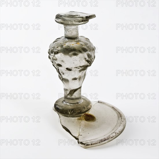 Fragment of foot and trunk of goblet (drinking bowl?), drinking glass drinkware tableware holder soil find glass, free blown