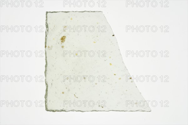 Fragment of small window, green tinted window glass, window glass building material soil find glass, w 5.1 cast drawn cut
