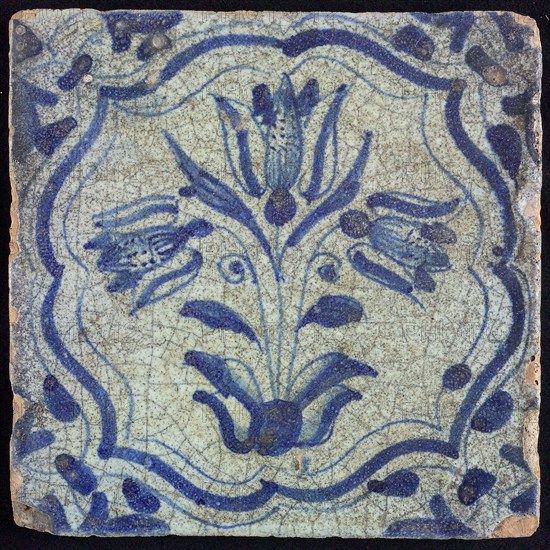 Flower tile with three-pillar tulip in brace frame, blue decor on white ground, corner filling: voluten, wall tile