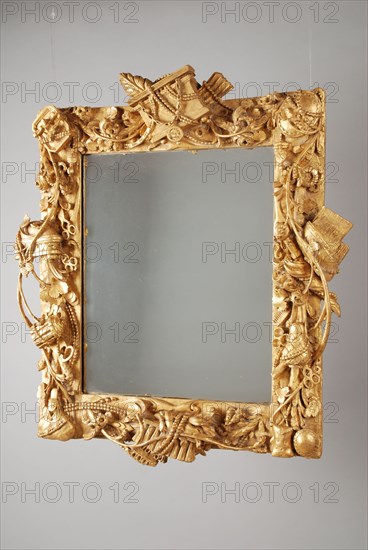 Gilded lime wood mirror in frame with cut toilet attributes, interior mirror glass glass linden wood gold leaf plywood wood
