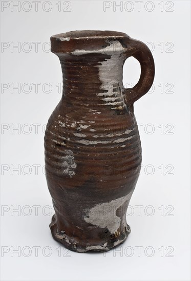 Stoneware jug pinched on foot, brown engobe, dents and deformed, pot jug tableware holder soil find ceramic stoneware clay