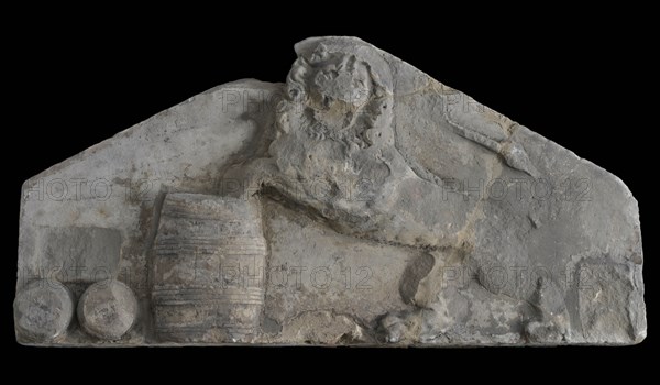 Facade stone with lion with front legs on standing barrel, facing brick fragment sculpture footage building component sandstone